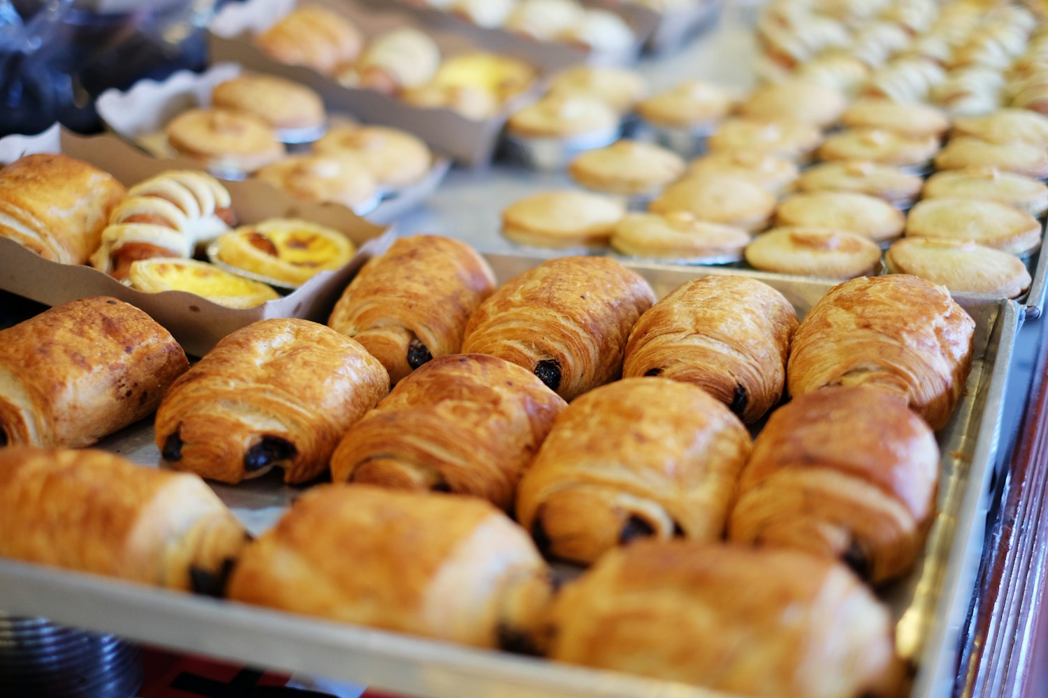 An artisan bakery counter and pastry display
